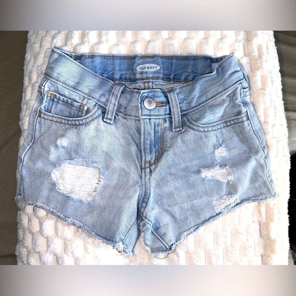 Last chance! Old Navy girls 7 cutoff distressed jean shorts, light wash color.